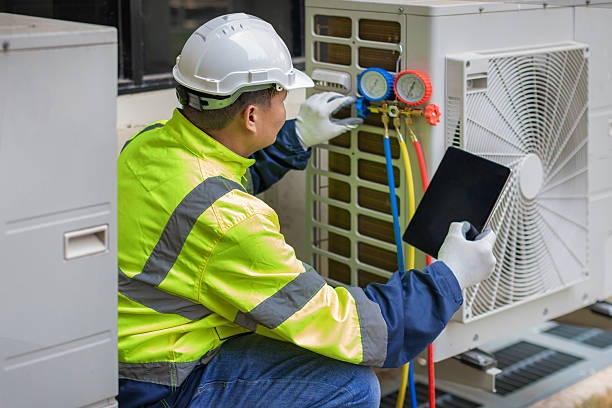 Professional Heat Pump Repair technician working in Roxboro, NC